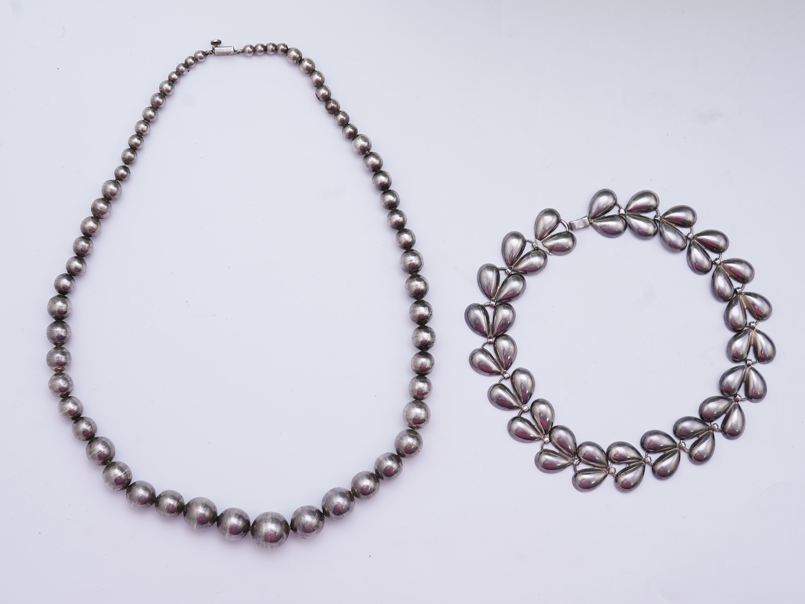 Two silver necklaces
